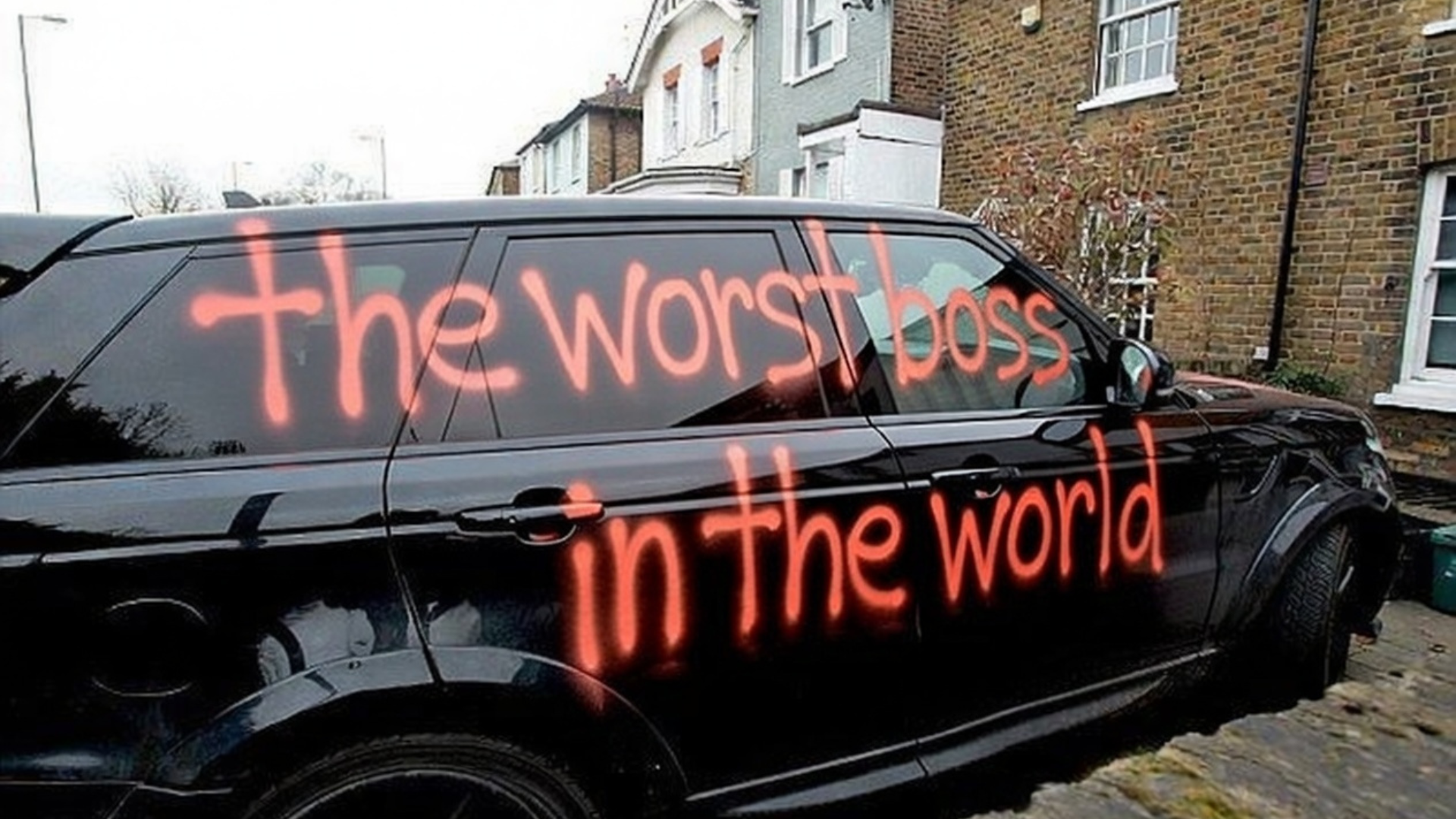 Black car with the message “the worst boss in the world”